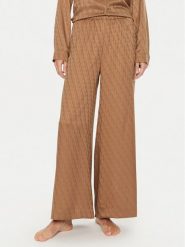 Calvin Klein Spodnie piżamowe 000QS7304E Brązowy Relaxed Fit. Brązowe piżamy damskie Calvin Klein, s, bez wzorów, z syntetyku, bez ramiączek. Za 179.99 zł.