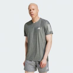 Koszulka Own The Run. Białe koszulki sportowe męskie Adidas, m, bez wzorów, z materiału, bez kołnierzyka, bez ramiączek, do biegania. Za 149.00 zł.