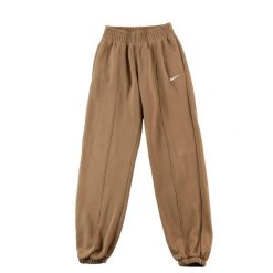 Second life - Spodnie dresowe męskie Nike - Jak nowy. Brązowe spodnie sportowe męskie Nike, m, bez wzorów, z dresówki, do biegania. Za 127.76 zł.