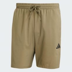 Szorty Essentials 3-Stripes Chelsea. Czarne krótkie spodenki sportowe męskie Adidas, m, bez wzorów, z materiału, na fitness i siłownię. Za 105.99 zł.