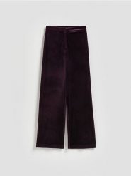 Welurowe spodnie - ciemnofioletowy. Fioletowe spodnie materiałowe damskie Reserved, l, bez wzorów, z dzianiny. Za 119.99 zł.