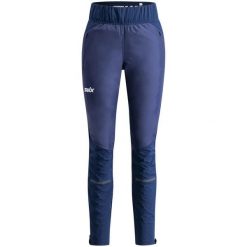 Spodnie narciarskie dla kobiet Swix Dynamic Hybrid. Niebieskie spodnie materiałowe damskie Swix, na zimę, l, bez wzorów, z materiału, na fitness i siłownię, primaloft. Za 869.55 zł.