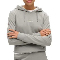 Jednokolorowa bluza z kapturem damska Superdry. Niebieskie bluzy damskie Superdry., xl, bez wzorów, z bawełny, z kapturem. Za 318.75 zł.