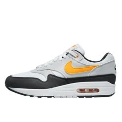 Buty do chodzenia dla dorosłych Air Max 1 White University Gold. Szare obuwie sportowe damskie Nike, bez wzorów, z materiału, trekkingowe, nike air max. Za 1,095.97 zł.