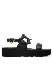 LOVE MOSCHINO Sandały JA16054I1MIA0000 Czarny. Czarne sandały damskie Love Moschino, bez wzorów, ze skóry, bez obcasa, na płaskiej podeszwie, bez zapięcia. Za 579.99 zł.