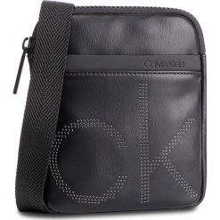 Saszetka CALVIN KLEIN - Ck Up Mini Flat Crossover K50K504353 001. Saszetki męskie marki Calvin Klein. Za 299.00 zł.