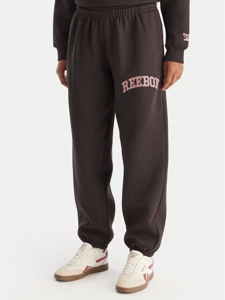 Reebok Spodnie dresowe Marvs RK25165CCW Czarny Regular Fit. Czarne spodnie dresowe damskie Reebok, xl, bez wzorów, z bawełny. Za 199.99 zł.