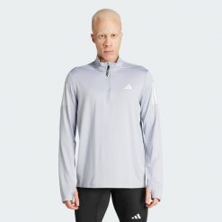 Bluza Own The Run Half-Zip. Białe bluzy męskie Adidas, m, bez wzorów, bez kaptura, do biegania. Za 219.00 zł.