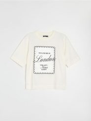 Bawełniana koszulka z haftem i motywem Londynu - kremowy. Białe t-shirty damskie Sinsay, l, bez wzorów, z bawełny, bez kołnierzyka. Za 25.99 zł.