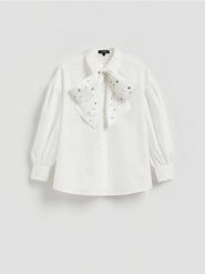 Koszula z wiązaniem - biały. Białe koszule damskie Reserved, l, bez wzorów, z bawełny, bez kołnierzyka, bez ramiączek. Za 179.99 zł.