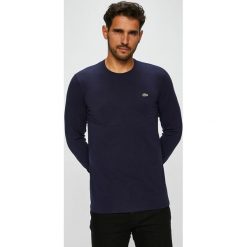 Lacoste - Longsleeve. Czarne bluzki z długim rękawem męskie Lacoste, z bawełny, z okrągłym kołnierzem. W wyprzedaży za 199.90 zł.