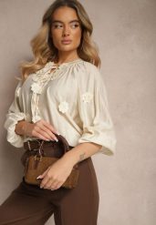 Beżowa Wiskozowa Koszula Zdobiona Wiązaniem i Aplikacjami z Kwiatami Belinea. Brązowe bluzki damskie Renee, z aplikacjami, z jeansu, eleganckie, bez kołnierzyka, bez ramiączek. Za 59.99 zł.