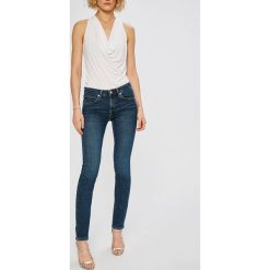 Calvin Klein Jeans - Jeansy Body. Niebieskie jeansy damskie Calvin Klein Jeans, z obniżonym stanem. W wyprzedaży za 299.90 zł.