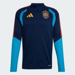 Koszulka treningowa Hiszpania 26 Tiro. Niebieskie koszulki sportowe męskie Adidas, xl, bez wzorów, bez kołnierzyka, bez ramiączek, do piłki nożnej. Za 329.00 zł.
