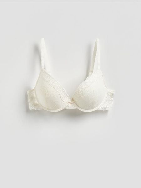 Biustonosz push up z koronką - złamana biel. Biustonosze Reserved, bez wzorów, z dzianiny. Za 49.99 zł.