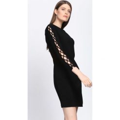 Czarna Sukienka Divergent. Czarne sukienki damskie Born2be, na jesień, z dzianiny. Za 59.99 zł.