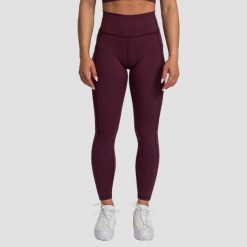 Legginsy damskie fitness z kieszenią bakłażanowe Mesh Panel. Czerwone legginsy damskie GYMBEAM, l, bez wzorów, z elastanu, na fitness i siłownię. Za 115.90 zł.