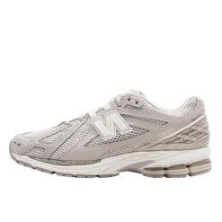 Buty do chodzenia dla dorosłych New Balance 1906R Grey Day. Szare obuwie sportowe damskie New Balance, bez wzorów, z materiału, do biegania. Za 1,033.45 zł.