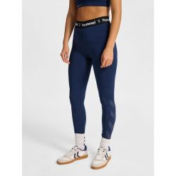 Damskie legginsy Hummel Pulse. Niebieskie legginsy sportowe damskie Hummel, bez wzorów, na fitness i siłownię. Za 175.00 zł.