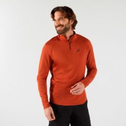 Bluza tenisowa termoaktywna męska Thermic na krótki suwak. Brązowe bluzy sportowe męskie ARTENGO, m, bez wzorów, z elastanu, tenisowe. Za 89.99 zł.