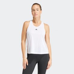 Koszulka fitness damska ADIDAS bez rękawów. Białe koszulki sportowe damskie Adidas, l, bez wzorów, z materiału, bez kołnierzyka, bez ramiączek, na fitness i siłownię. W wyprzedaży za 79.99 zł.