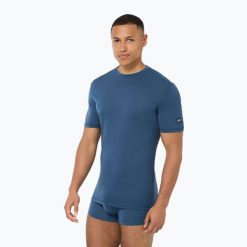 Koszulka termoaktywna męska super.natural Sierra 140 Tee. Niebieskie koszulki sportowe męskie super.natural, m, bez wzorów, bez kołnierzyka, bez ramiączek, narciarskie. Za 239.99 zł.