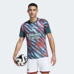 Koszulka przedmeczowa Arsenal FC 26/27. Zielone koszulki sportowe męskie Adidas, l, bez wzorów, z materiału, bez kołnierzyka, bez ramiączek, do piłki nożnej, climacool (adidas). Za 299.00 zł.