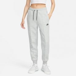 Spodnie sportowe damskie Sportswear Tech Fleece Pant. Szare spodnie sportowe damskie Nike, l, bez wzorów, z bawełny, do biegania. Za 310.85 zł.