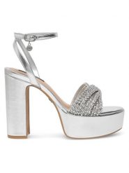 Nine West Sandały WFA2736-1 Srebrny. Szare klapki damskie Nine West, bez wzorów, z syntetyku, bez obcasa, na słupku, bez zapięcia. Za 155.99 zł.