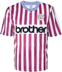 Koszulka wyjazdowa Manchester City retro 1988/89 męska Burgundy Mix. Czerwone koszulki sportowe męskie MANCHESTER CITY, na jesień, m, bez wzorów, z materiału, bez kołnierzyka, bez ramiączek, do piłki nożnej. Za 233.99 zł.