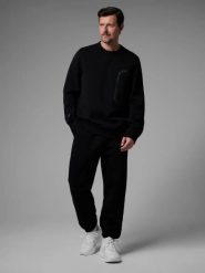 Spodnie dresowe joggery męskie 4F x Robert Lewandowski 4F RL9SAW25TTROM1703. Czarne spodnie sportowe męskie 4f, m, bez wzorów, z bawełny, trekkingowe. Za 160.99 zł.