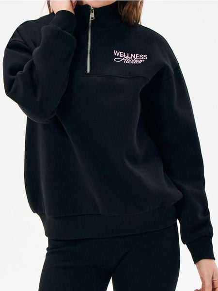 Bluza z haftowanym napisem - czarny. Czarne bluzy damskie Sinsay, l, bez wzorów, bez kaptura. Za 35.99 zł.