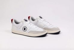 Sneakersy męskie K-Swiss K-Varsity trampki buty sportowe białe. Białe trampki męskie K-SWISS, bez wzorów, sportowe, bez zapięcia. Za 267.15 zł.