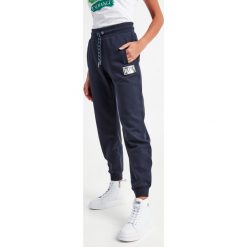 Spodnie dresowe damskie ARMANI EXCHANGE. Legginsy damskie Armani Exchange, xs, bez wzorów, z dresówki. W wyprzedaży za 487.20 zł.
