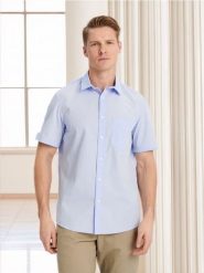 Koszula regular fit - błękitny. Niebieskie koszule męskie Sinsay, l, bez wzorów, bez kołnierzyka, bez ramiączek. Za 29.99 zł.