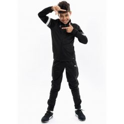 Dres treningowy chłopięcy Puma 65865503. Białe spodnie sportowe dla chłopców Puma, bez wzorów, z dresówki, sportowe, na jogę i pilates. Za 189.00 zł.