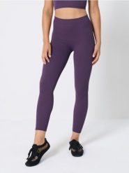 Sportowe legginsy bezszwowe - fioletowy. Fioletowe legginsy damskie Sinsay, l, bez wzorów. Za 35.99 zł.