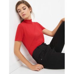 T-shirt z golfem. Niebieskie t-shirty damskie Orsay, z dzianiny, z golfem. Za 29.99 zł.