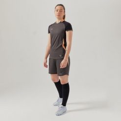 Spodenki do piłki nożnej damskie Kipsta. Niebieskie szorty sportowe damskie KIPSTA, l, bez wzorów, z materiału, sportowe, do piłki nożnej. W wyprzedaży za 44.99 zł.