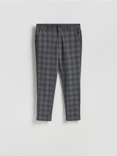 Spodnie slim fit w kratę - ciemnoszary. Szare spodnie materiałowe męskie Reserved, l, bez wzorów, z tkaniny. Za 149.99 zł.