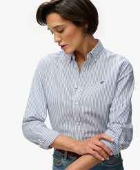 Superdry Damska koszula Oxford slim z długim rękawem – AZURE BLUE STRIPE OXFORD. Niebieskie koszule damskie Superdry., bez wzorów, z bawełny, bez kołnierzyka, bez ramiączek. Za 296.15 zł.