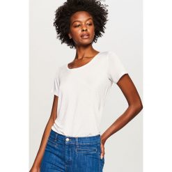 Gładki t-shirt - Biały. T-shirty damskie marki DOMYOS. W wyprzedaży za 29.99 zł.