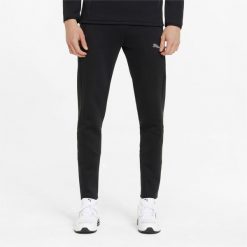 Spodnie męskie Puma EVOSTRIPE. Czarne buty sportowe męskie Puma, m, bez wzorów, z dresówki, do piłki nożnej. Za 281.99 zł.