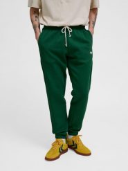 Spodnie do biegania Hummel Loose Bee. Zielone spodnie materiałowe damskie Hummel, xs, bez wzorów, z bawełny, do biegania. Za 211.55 zł.