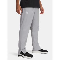 Spodnie męskie Under Armour Rival Woven Windbreaker Pant. Szare spodnie sportowe męskie Under Armour, m, bez wzorów, na fitness i siłownię. Za 129.99 zł.