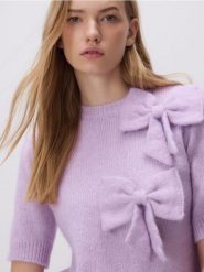 Sweter z kokardami - fioletowy. Fioletowe swetry damskie Reserved, l, bez wzorów, z dzianiny, bez kołnierzyka, bez ramiączek, bez kaptura. Za 129.99 zł.