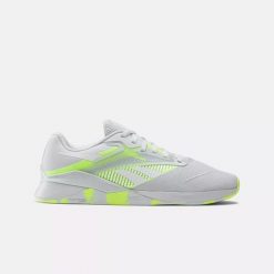 Sneakersy damskie Reebok Nano X4 buty sportowe treningowe tenisówki białe/żółte. Białe obuwie sportowe damskie Reebok, tenisowe. Za 449.00 zł.
