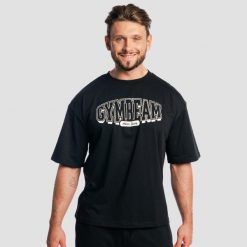 Koszulka męska fitness oversize czarna Athletic Society Boxy. Czarne koszulki sportowe męskie GYMBEAM, m, bez wzorów, z bawełny, bez kołnierzyka, bez ramiączek, na fitness i siłownię. Za 89.90 zł.