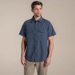 Koszula Craghoppers Kiwi II. Niebieskie koszule męskie Craghoppers, m, bez wzorów, casualowe, bez kołnierzyka, bez ramiączek. Za 210.05 zł.