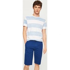 Szorty chino - Granatowy. Niebieskie spodnie materiałowe męskie Reserved, m, bez wzorów. W wyprzedaży za 59.99 zł.